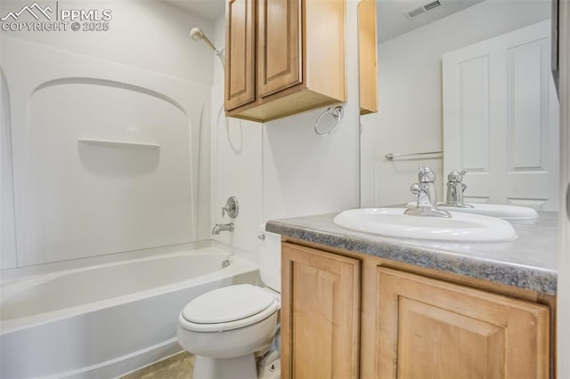 7689 Sniktau Pt, Peyton, CO 80831 - bathroom featuring vanity, toilet, and washtub / shower combination