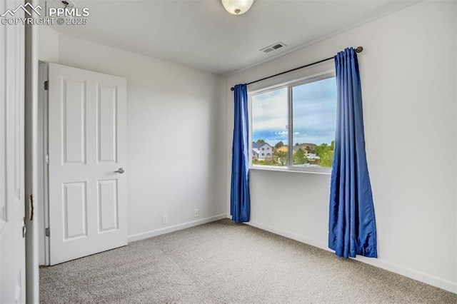 7689 Sniktau Pt, Peyton, CO 80831 - empty room with carpet floors and baseboards