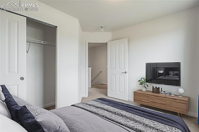 7689 Sniktau Pt, Peyton, CO 80831 - carpeted bedroom with a closet and baseboards