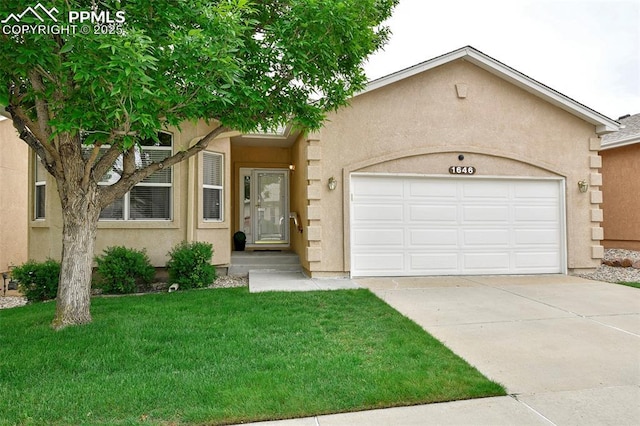 1646 Pinon Glen Cir, Colorado Springs, CO 80919 - view of front of home with stucco siding, a front yard, driveway, and a garage