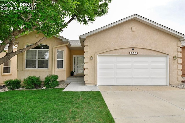 1646 Pinon Glen Cir, Colorado Springs, CO 80919 - view of front of home featuring stucco siding, concrete driveway, a garage, and a front yard
