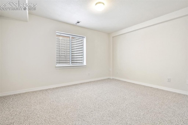 1646 Pinon Glen Cir, Colorado Springs, CO 80919 - carpeted empty room with baseboards