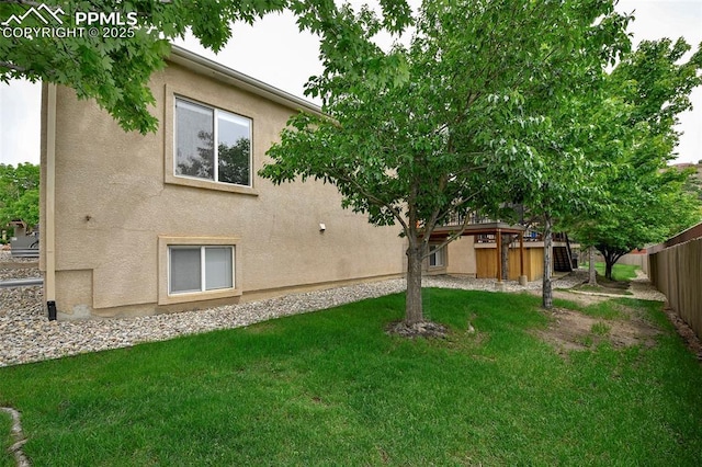 1646 Pinon Glen Cir, Colorado Springs, CO 80919 - rear view of house featuring stucco siding