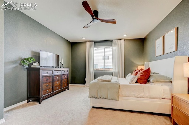 10806 Rolling Peaks Dr, Peyton, CO 80831 - carpeted bedroom with baseboards, a textured wall, and ceiling fan