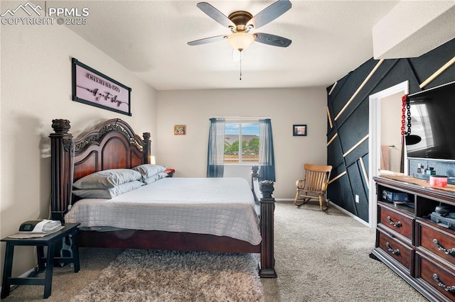 5228 Gannet Ln, Pueblo, CO 81008 - carpeted bedroom featuring a ceiling fan and baseboards