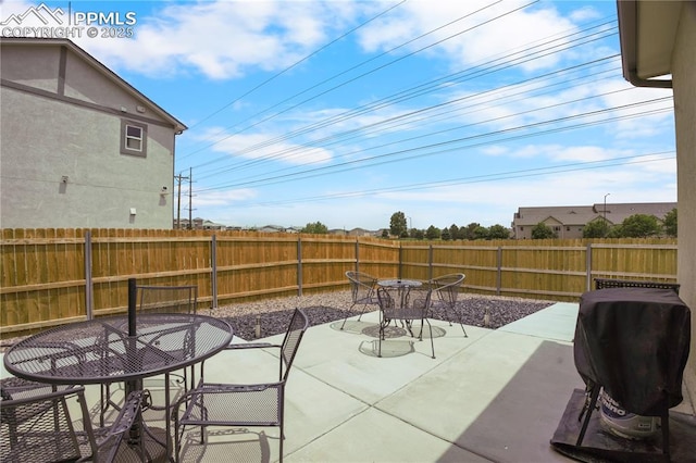 5228 Gannet Ln, Pueblo, CO 81008 - fenced backyard featuring outdoor dining area and a patio area