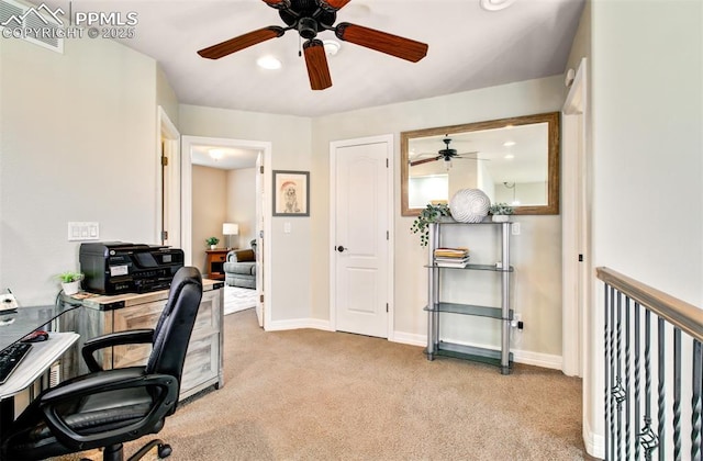 2582 Indian Hills Grv, Colorado Springs, CO 80907 - home office featuring ceiling fan, light carpet, and baseboards