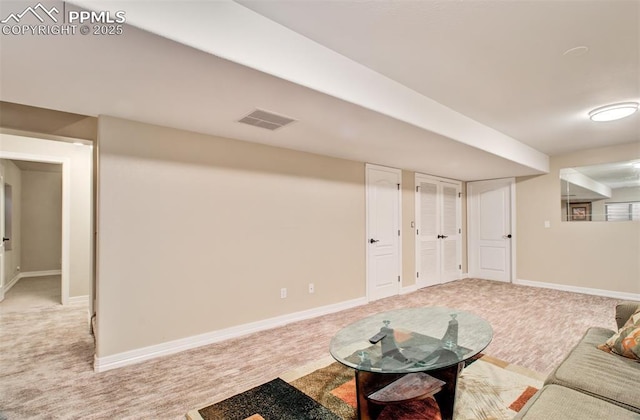2582 Indian Hills Grv, Colorado Springs, CO 80907 - living room with light colored carpet and baseboards
