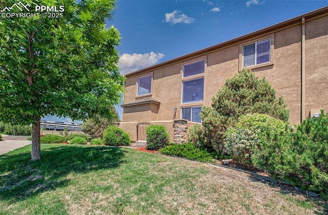 2582 Indian Hills Grv, Colorado Springs, CO 80907 - view of grassy yard