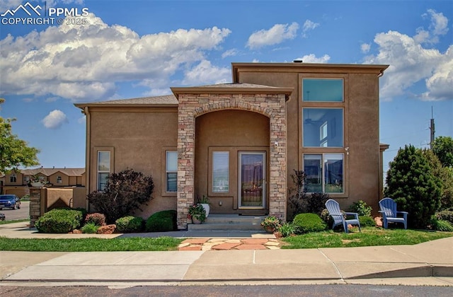 2582 Indian Hills Grv, Colorado Springs, CO 80907 - view of front of property featuring stucco siding and stone siding