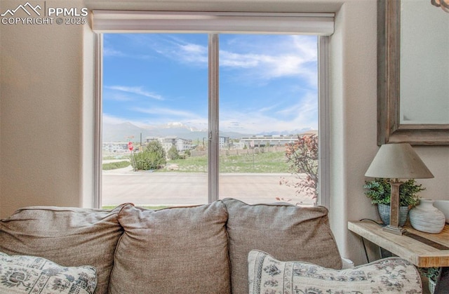 2582 Indian Hills Grv, Colorado Springs, CO 80907 - living room with plenty of natural light and a textured wall