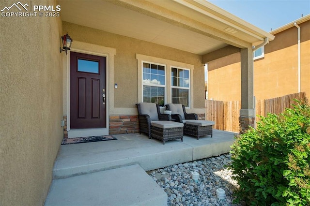 10208 Abrams Dr, Colorado Springs, CO 80925 - view of exterior entry featuring stucco siding and stone siding