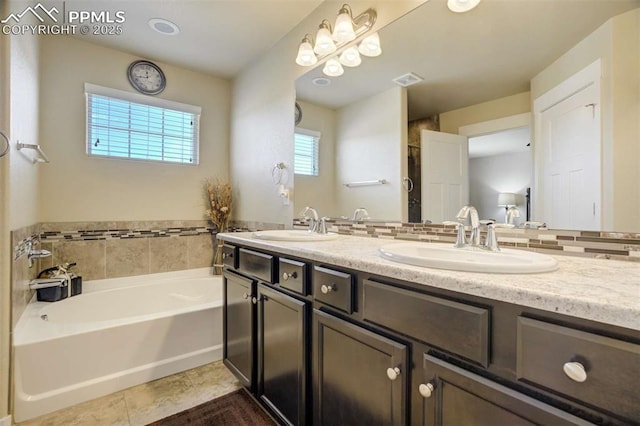 10208 Abrams Dr, Colorado Springs, CO 80925 - full bath with a bath and double vanity