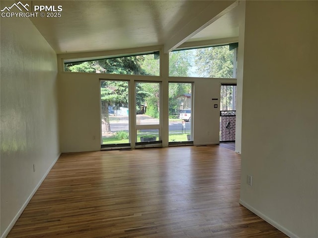 2619 N Arcadia St, Colorado Springs, CO 80907 - empty room with wood finished floors and baseboards