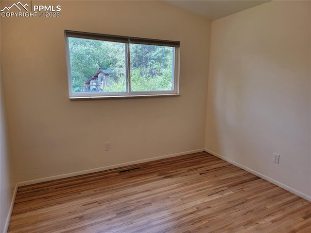 2619 N Arcadia St, Colorado Springs, CO 80907 - unfurnished room with wood finished floors and baseboards