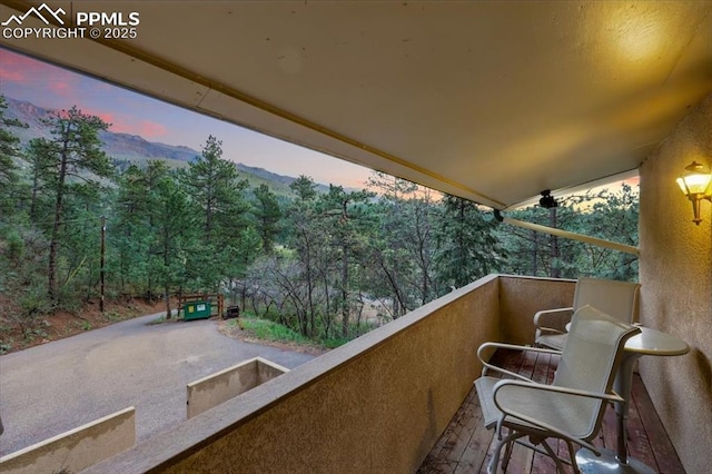 4840 Pikes Peak Hwy, Cascade, CO 80809 - balcony at dusk with a mountain view