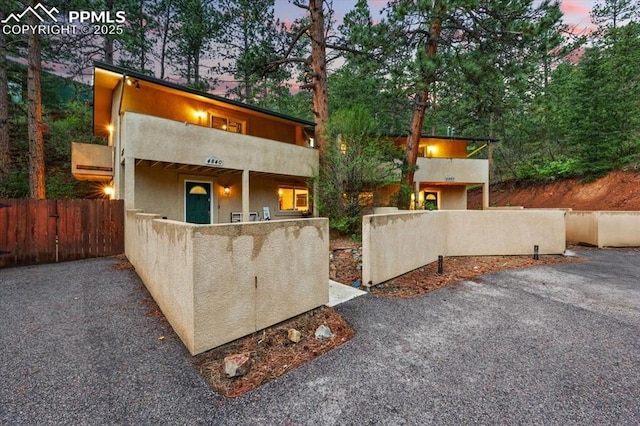 4840 Pikes Peak Hwy, Cascade, CO 80809 - view of front of house with stucco siding