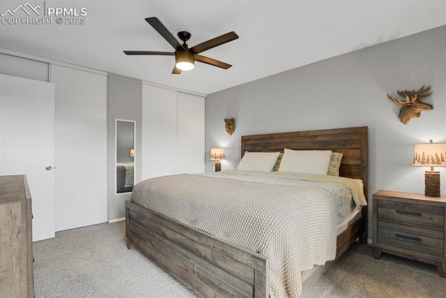5870 S Perth Pl, Centennial, CO 80015 - carpeted bedroom featuring two closets and a ceiling fan