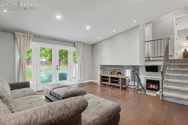 5870 S Perth Pl, Centennial, CO 80015 - living area featuring wood finished floors, french doors, recessed lighting, stairs, and a high end fireplace