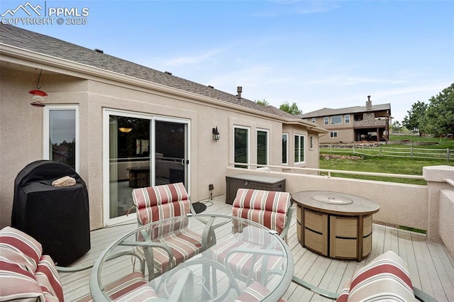 20280 Melanie Ann Ct, Monument, CO 80132 - wooden deck featuring outdoor dining space