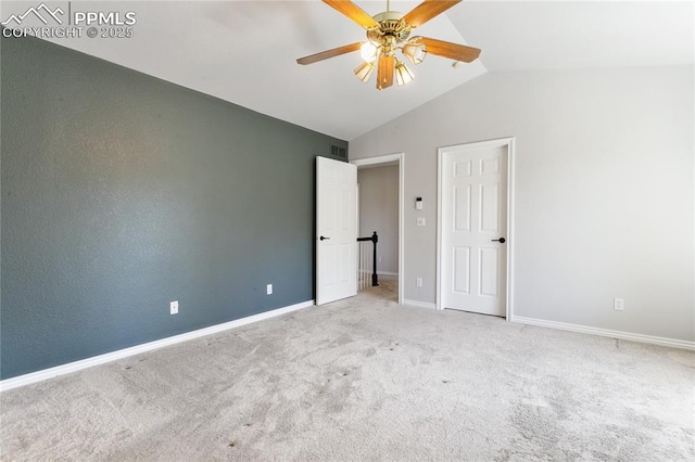 531 Saber Creek Dr, Monument, CO 80132 - unfurnished bedroom featuring vaulted ceiling, carpet floors, baseboards, and a ceiling fan