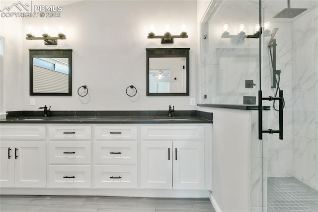 531 Saber Creek Dr, Monument, CO 80132 - full bath featuring a marble finish shower and double vanity