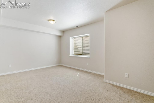 531 Saber Creek Dr, Monument, CO 80132 - spare room with light carpet and baseboards