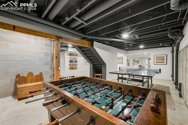 3320 Camels Ridge Ln, Colorado Springs, CO 80904 - playroom with concrete flooring