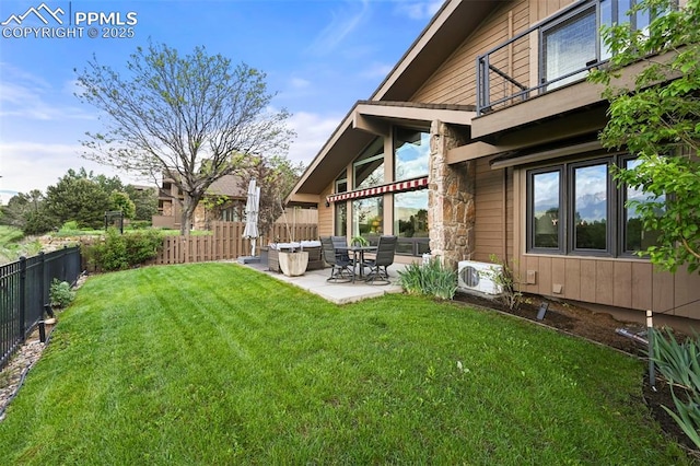 3320 Camels Ridge Ln, Colorado Springs, CO 80904 - fenced backyard featuring a patio area