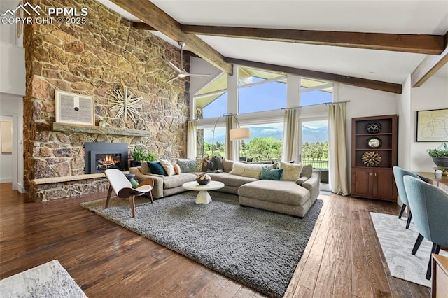3320 Camels Ridge Ln, Colorado Springs, CO 80904 - living area with wood-type flooring and a stone fireplace