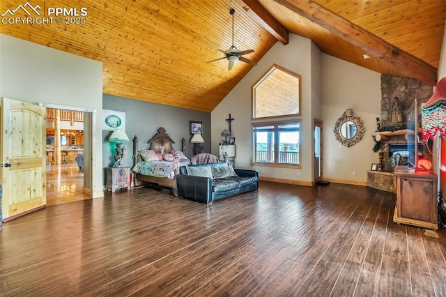 15958 Shadow Mountain Ranch Rd, Larkspur, CO 80118 - bedroom featuring high vaulted ceiling, wood finished floors, wood ceiling with exposed beams, and baseboards