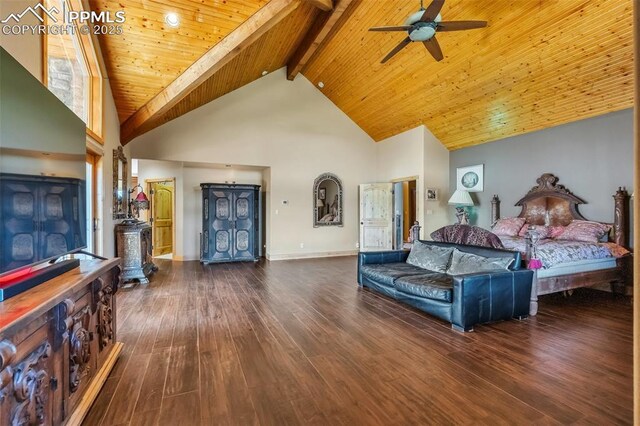 15958 Shadow Mountain Ranch Rd, Larkspur, CO 80118 - bedroom featuring high vaulted ceiling, wood finished floors, wood ceiling with exposed beams, and baseboards