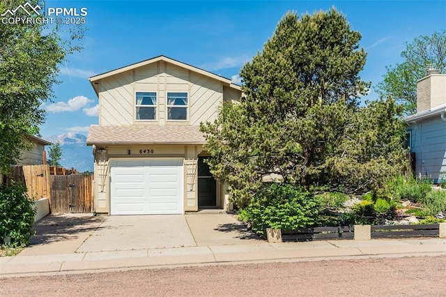 6430 Chantilly Pl, Colorado Springs, CO 80922 - view of front of home with a garage and driveway