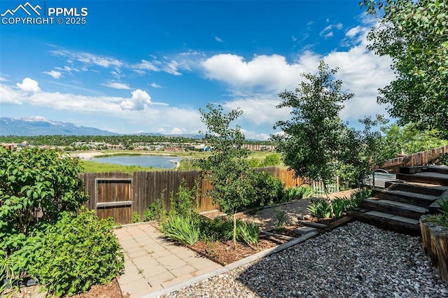 6430 Chantilly Pl, Colorado Springs, CO 80922 - view of yard with a water and mountain view