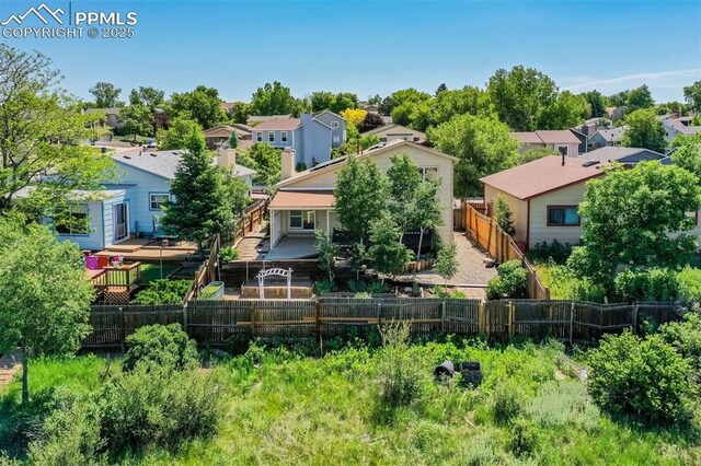 6430 Chantilly Pl, Colorado Springs, CO 80922 - rear view of property featuring a residential view and a fenced backyard