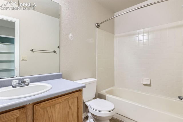 9412 Dew Drop Ct, Colorado Springs, CO 80925 - bathroom with toilet, vanity, and tub / shower combination