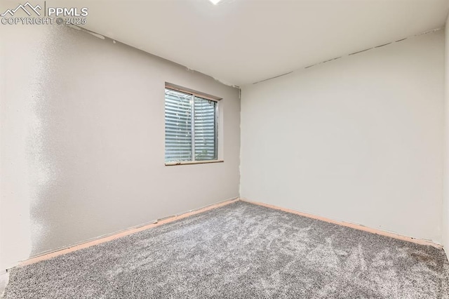 9412 Dew Drop Ct, Colorado Springs, CO 80925 - carpeted empty room featuring baseboards