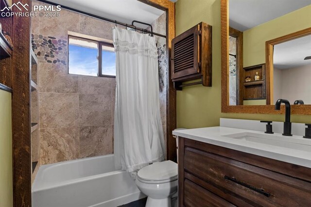 527 W Columbia St, Colorado Springs, CO 80907 - full bathroom with toilet, vanity, and shower / tub combo with curtain