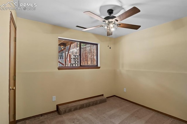 527 W Columbia St, Colorado Springs, CO 80907 - carpeted spare room featuring ceiling fan and baseboards