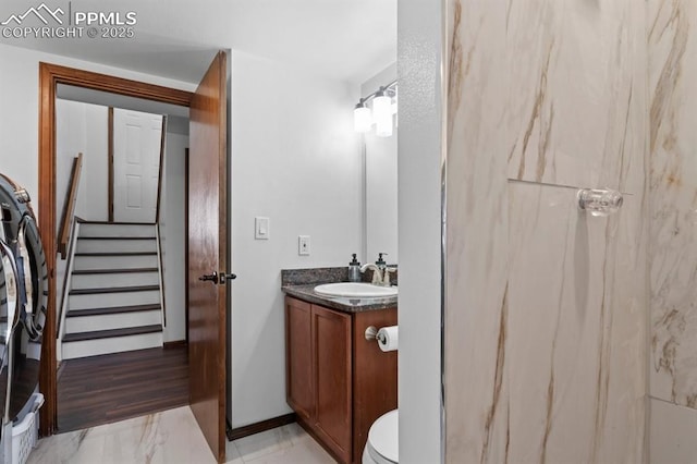 527 W Columbia St, Colorado Springs, CO 80907 - full bath with vanity, toilet, and a marble finish shower