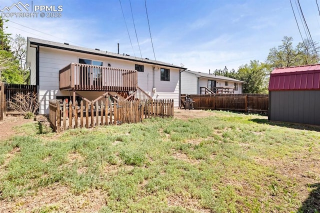 527 W Columbia St, Colorado Springs, CO 80907 - back of property with a wooden deck and stairway
