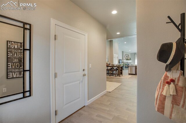 529 Brecken Ct Unit A, Woodland Park, CO 80863 - hallway featuring recessed lighting, light wood-type flooring, and baseboards