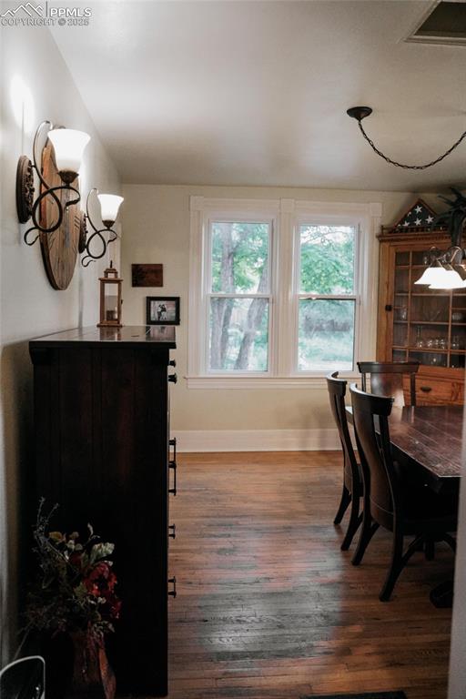 817 Swope Ave, Colorado Springs, CO 80909 - dining room with wood finished floors and baseboards