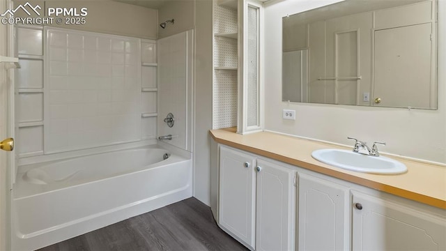 900 Beaver Creek Dr, Florissant, CO 80816 - full bathroom with shower / tub combination, vanity, and wood finished floors