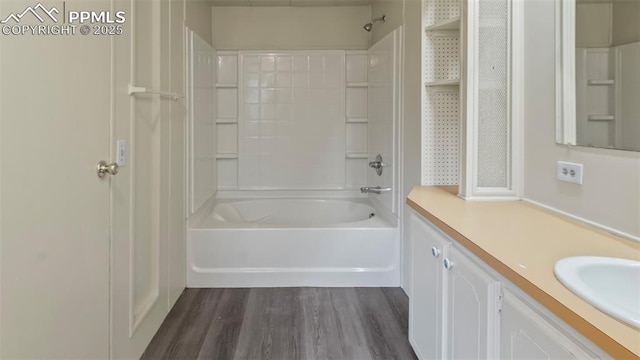 900 Beaver Creek Dr, Florissant, CO 80816 - full bath with vanity, shower / bath combination, and wood finished floors