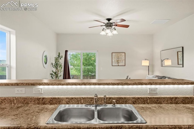 10067 Seawolf Dr, Colorado Springs, CO 80925 - kitchen featuring a sink and a ceiling fan