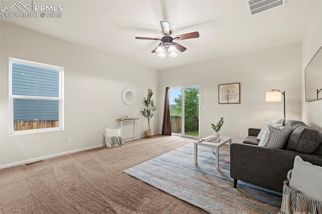10067 Seawolf Dr, Colorado Springs, CO 80925 - living area featuring ceiling fan, carpet, and baseboards