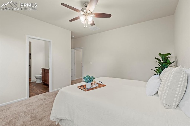 10067 Seawolf Dr, Colorado Springs, CO 80925 - carpeted bedroom with baseboards, connected bathroom, and ceiling fan