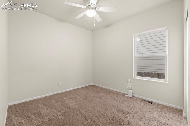 10067 Seawolf Dr, Colorado Springs, CO 80925 - spare room featuring carpet, baseboards, and ceiling fan