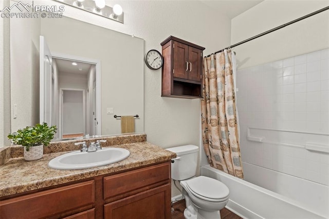 10067 Seawolf Dr, Colorado Springs, CO 80925 - bathroom with vanity, toilet, and shower / bath combo with shower curtain